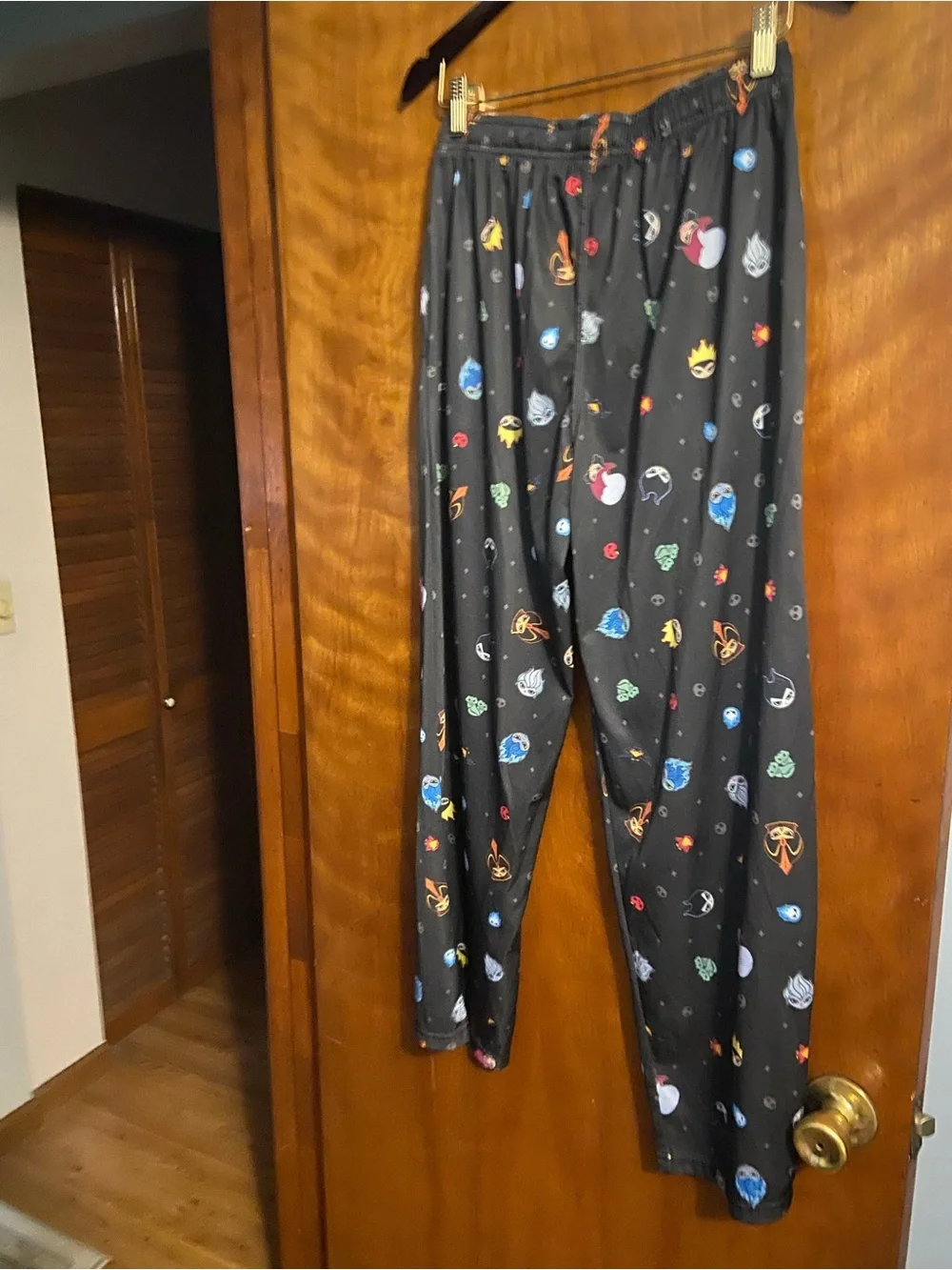 Disney Black Pajama Pants with Multicolor Space Characters and Purple Drawstring - Picture 2 of 3